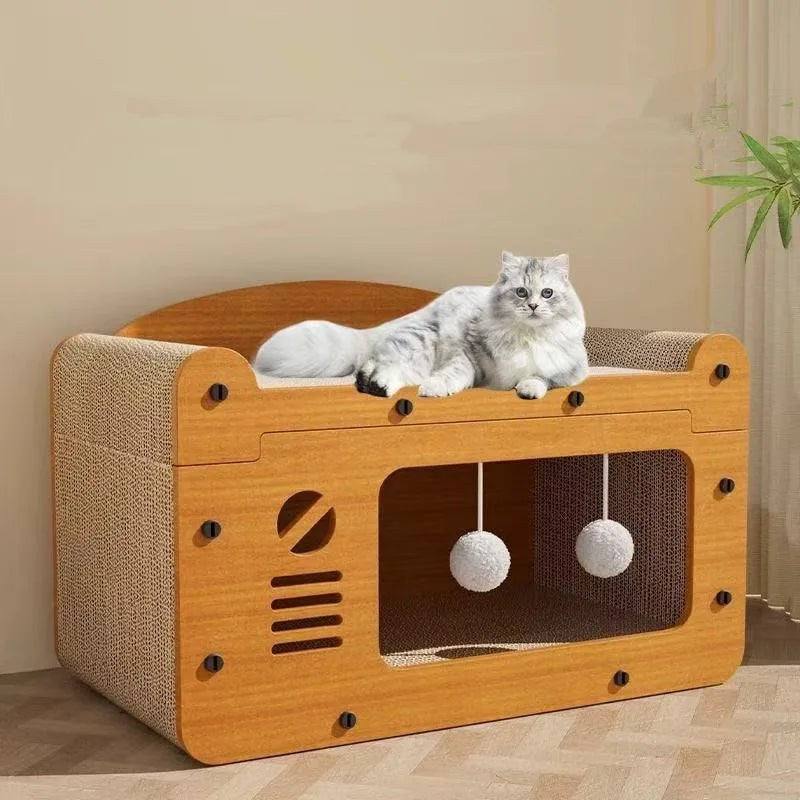Maison-lit griffoir en carton, chat allongé sur le toit